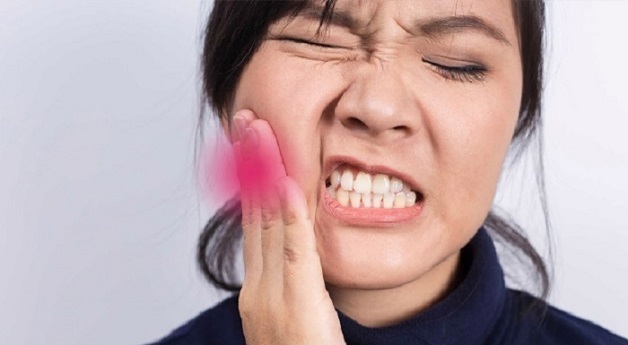 Cách giảm đau khi bị ê buốt sau khi nhổ răng khôn